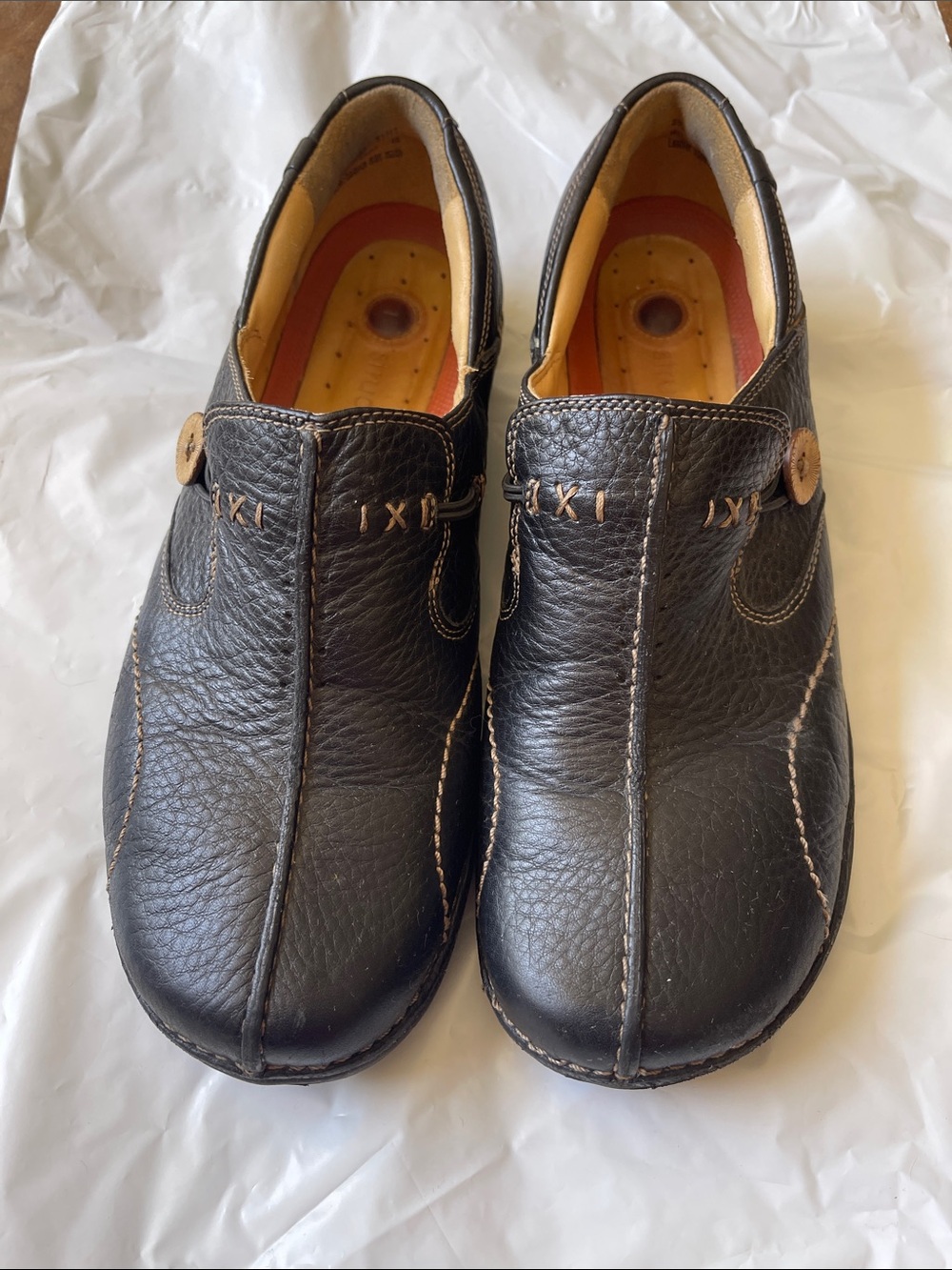 Clarks Black Leather Slip-On Loafers with Wooden Button Accent